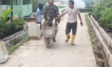Satgas TMMD Pasang U-Ditch Drainase di Ruas 12 Guna Kurangi Genangan Air 