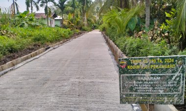 Satgas TMMD Tuntas Semenisasi  Jalan di Lokasi TMMD