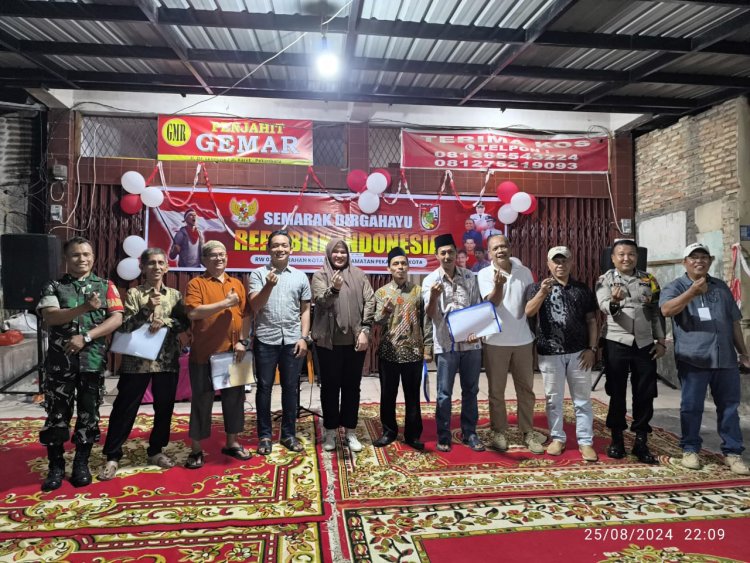 Babinsa Kodim 0301/Pbr Monitoring Malam Puncak HUT RI di Kec.Pekanbaru Kota