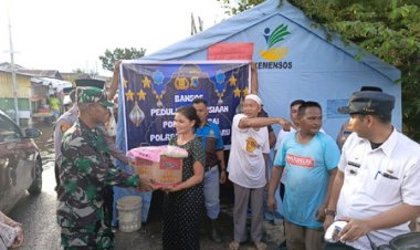 Kodim 0301/Pbr Berikan Bantuan Pada Korban Banjir di Rumbai
