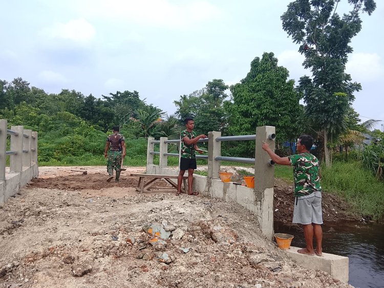 Kodim 0301/Pekanbaru dan Warga Bahu-Membahu Sukseskan Pembangunan Jembatan Garuda